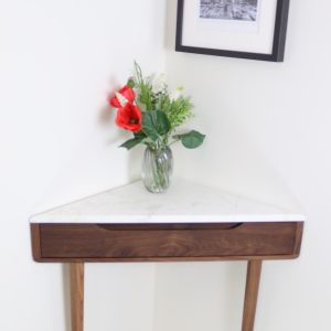 Corner console table in Walnut or Oak with Marble top.