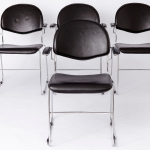 Set of 4 Vintage Cantilever Chairs – Sleek Metal Frame with Black Upholstery, Stackable Design