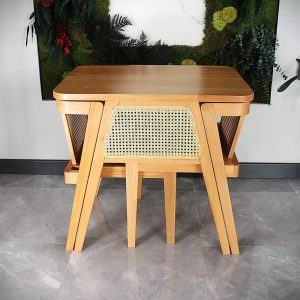 3-piece table and chair set. Perfect for limited spaces with its wicker and interlocking structure.