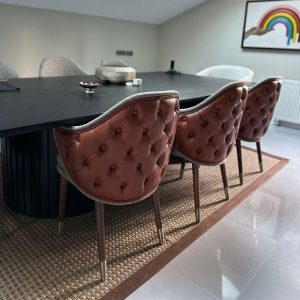 Wooden dining room chair with quilted back, suitable for use in interior design projects, hotels, restaurants and all home furniture.