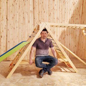 A-frame climbing set with walls, bench, monkey bars, slide and balance beam